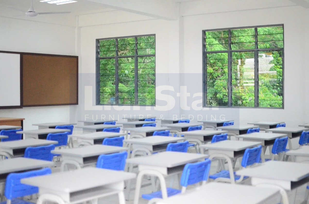 Grey student desks and blue chairs arranged in classroom rows.