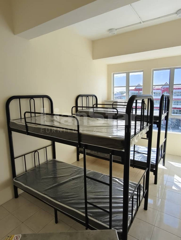 Black double-decker bunk beds delivered for an asrama project in Sarikei, Sarawak