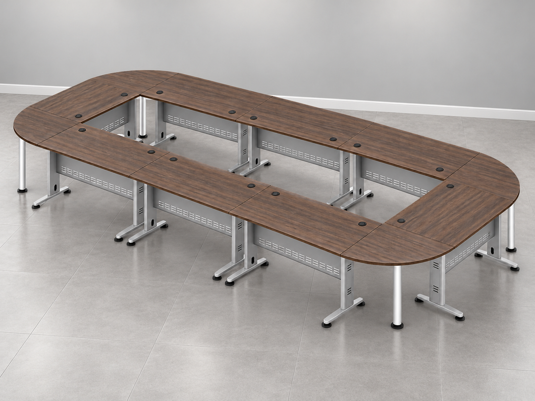 Q open-centre meeting table set with silver J-Leg steel supports against a grey wall and tiled floor