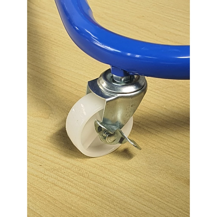 White castor wheel with locking lever.