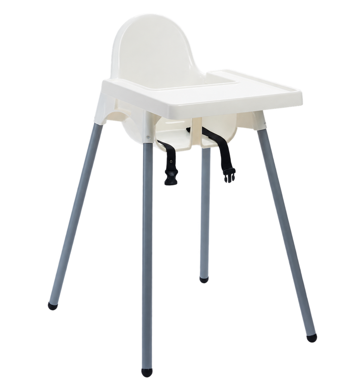 White FCI baby chair with fitted tray.
