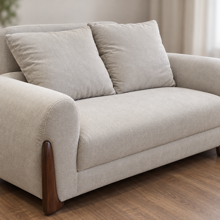 Plain fabric upholstery, loose back cushions and bench seat