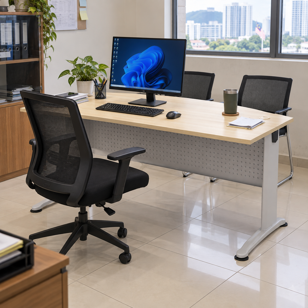 B-Series BMB 180A desk in a Malaysian office, operator on the longer-foot seating side