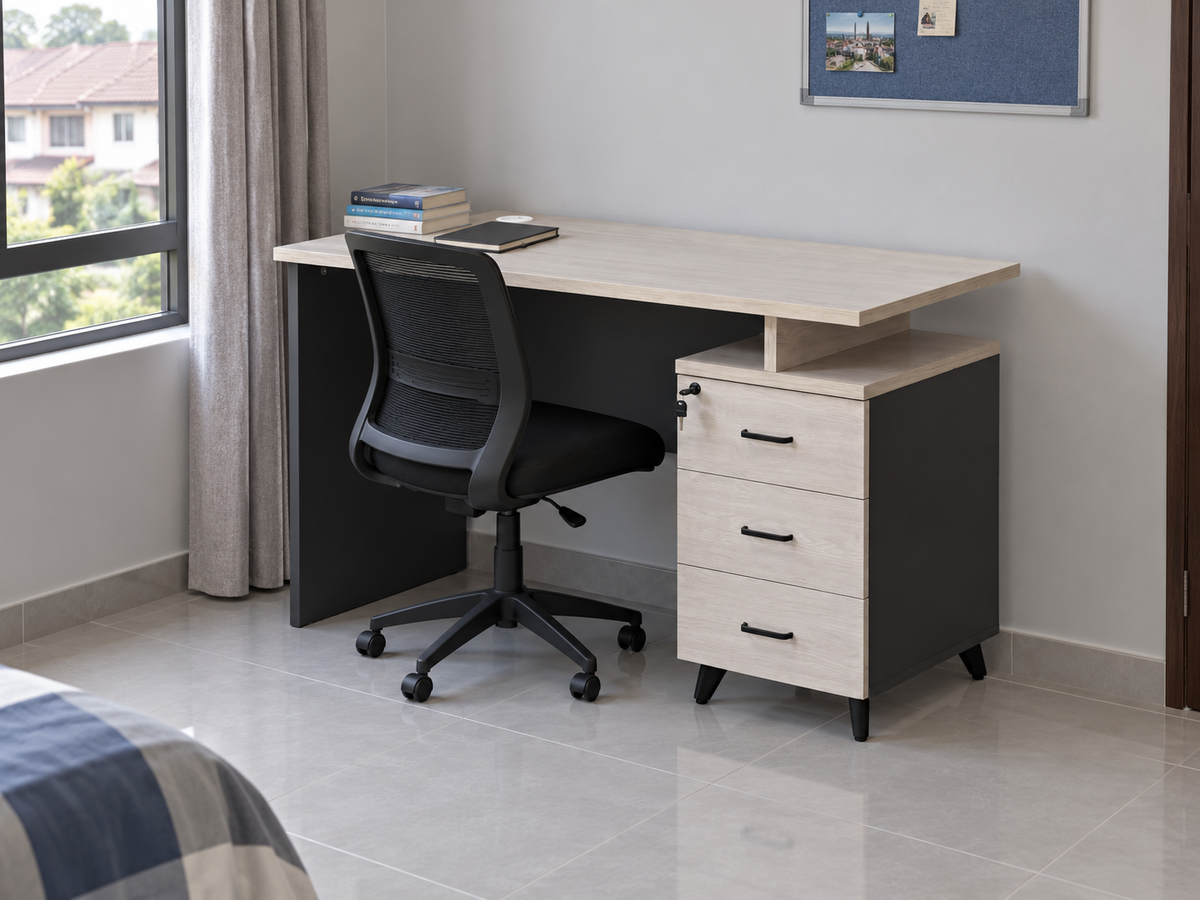 Grey three-drawer study desk in a Malaysian home study corner