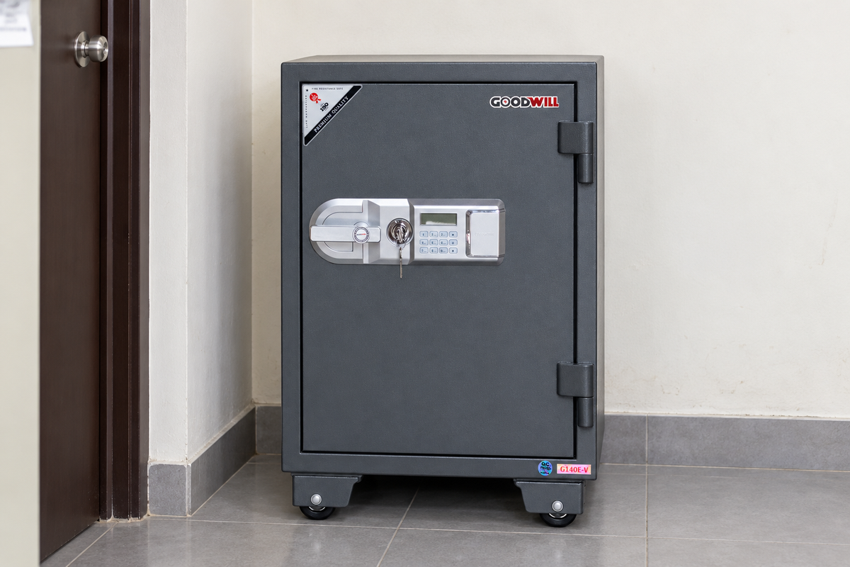 GoodWill G140E-V vertical digital safe in a Malaysian workplace, model-specific lifestyle image