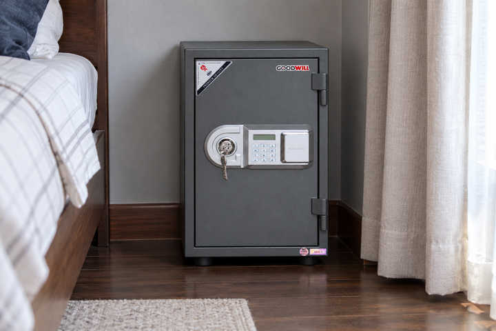 GoodWill G65E-V vertical digital safe in a Malaysian home, model-specific lifestyle image