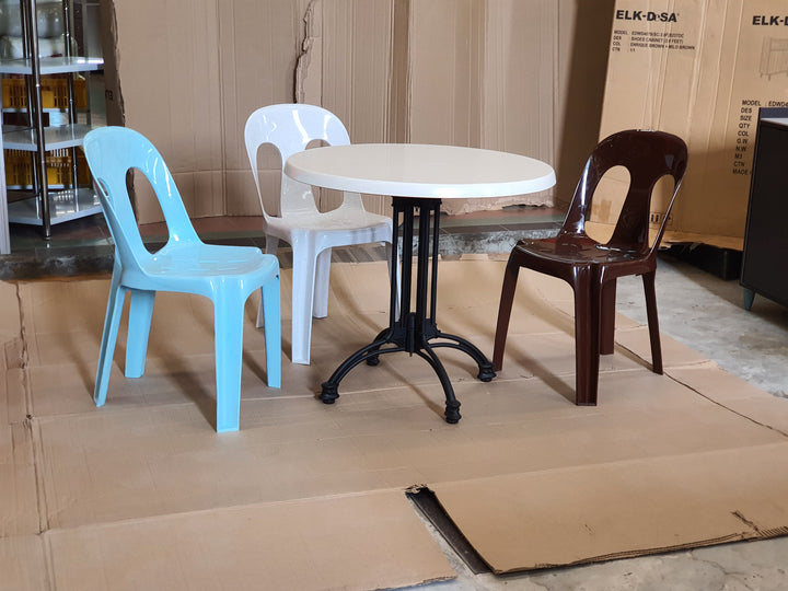 Original Inova chairs around a table; chair colours shown