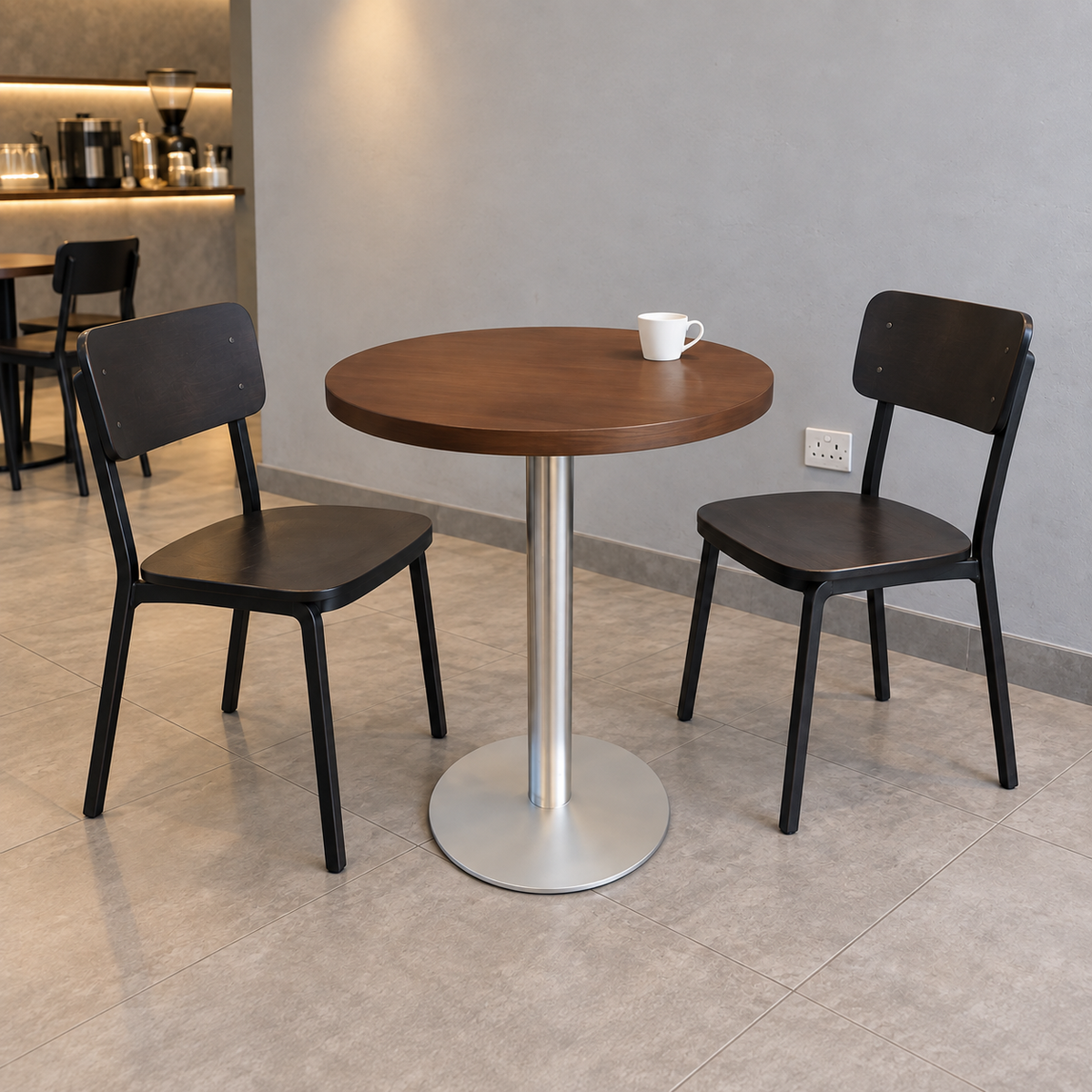 Stainless Steel Round Base Cafe Table — stainless round lifestyle (square)