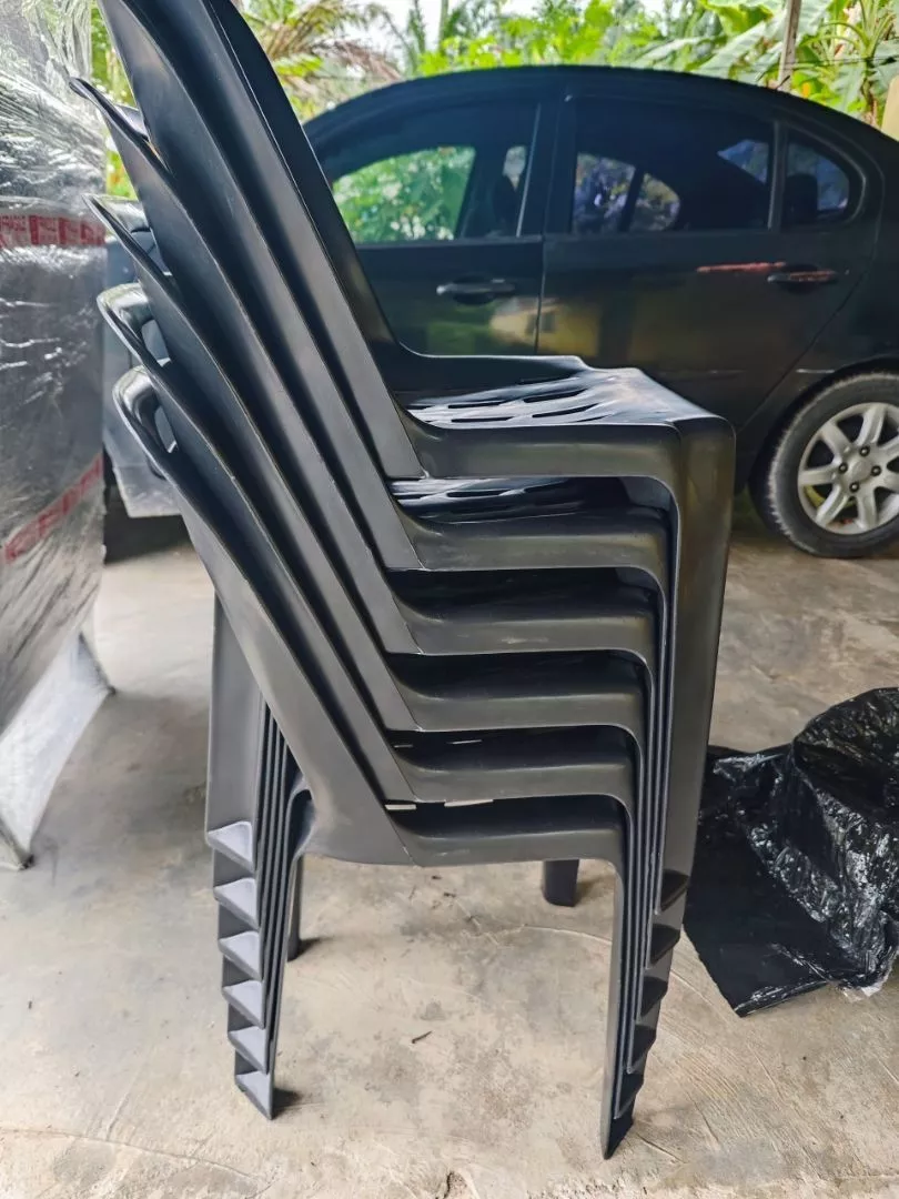 Original black side chairs stacked together