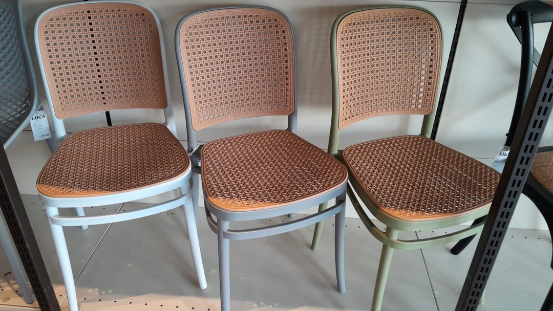 Original Nordin chairs: three pale, grey and olive-toned frames