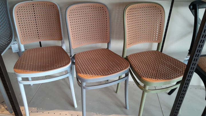 Original Nordin chairs: three pale, grey and olive-toned frames